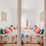 Cozy And Stylish Room With Natural Light And Vibrant Decor