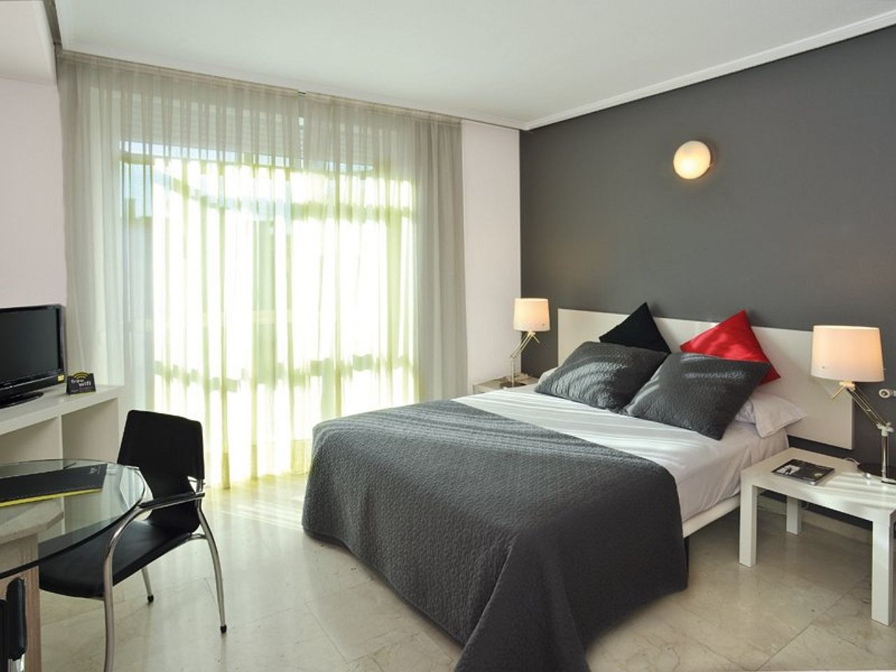 Aparthotel Sercotel Togumar 3*