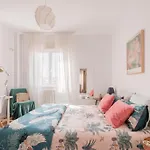 Cozy And Stylish Room With Natural Light And Vibrant Decor