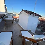 Chic Penthouse With Urban Charm & Rooftop