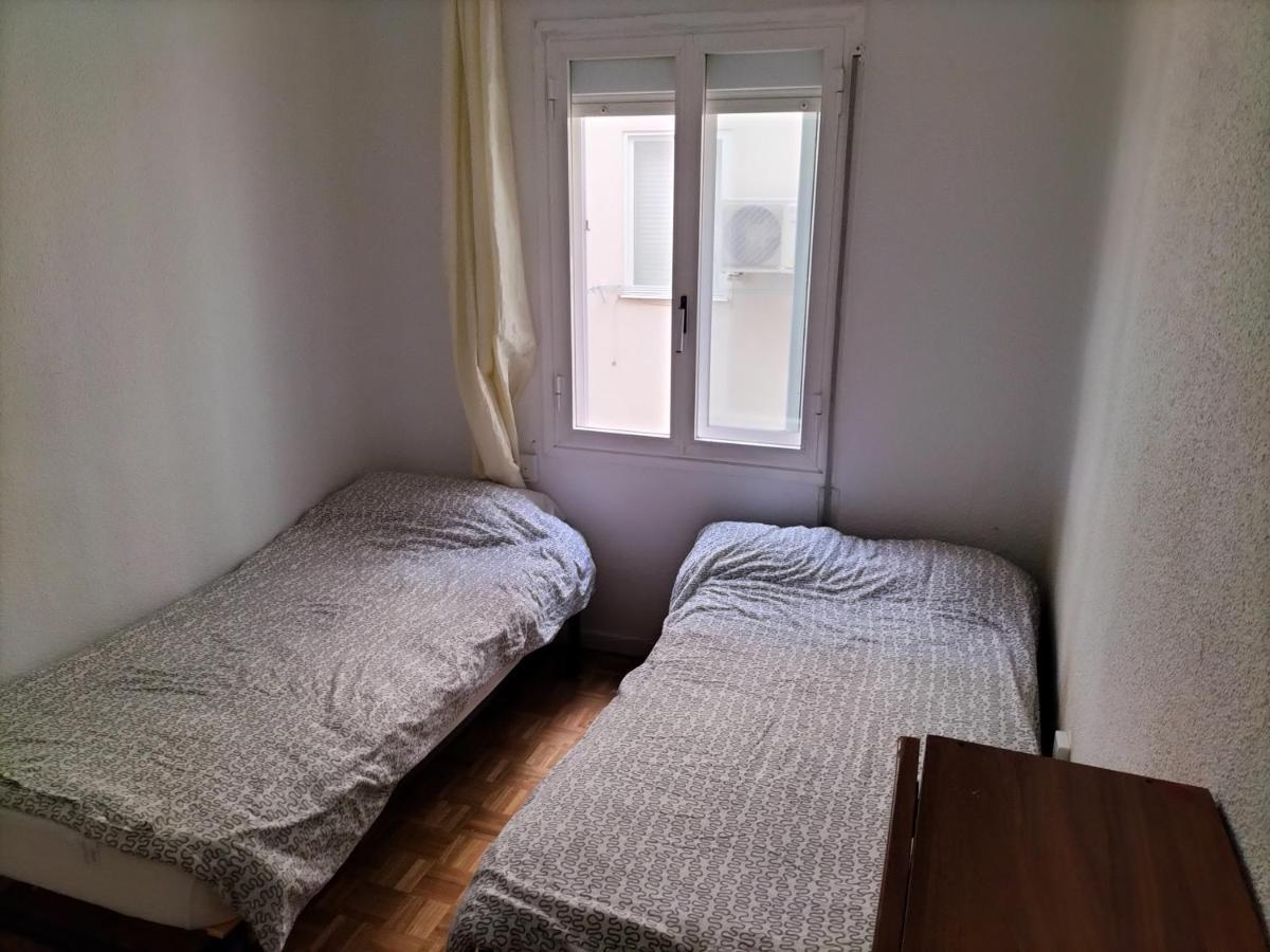 En Piso Con Bano Y Cocina Compartido Habitación en casa particular Madrid