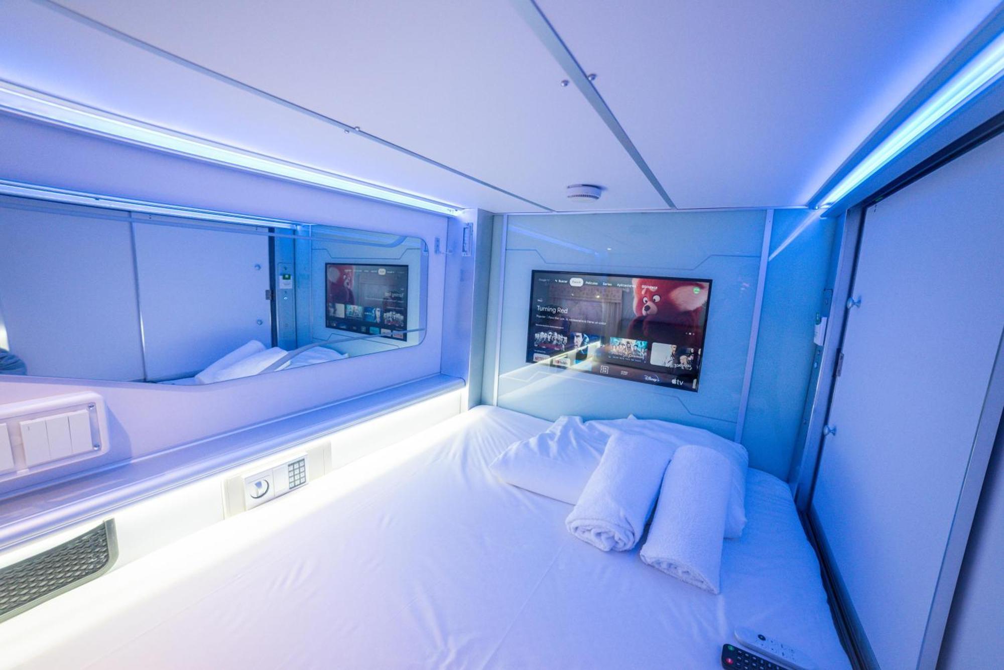 Capsule hotel Optimi *