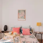 Cozy And Stylish Room With Natural Light And Vibrant Decor