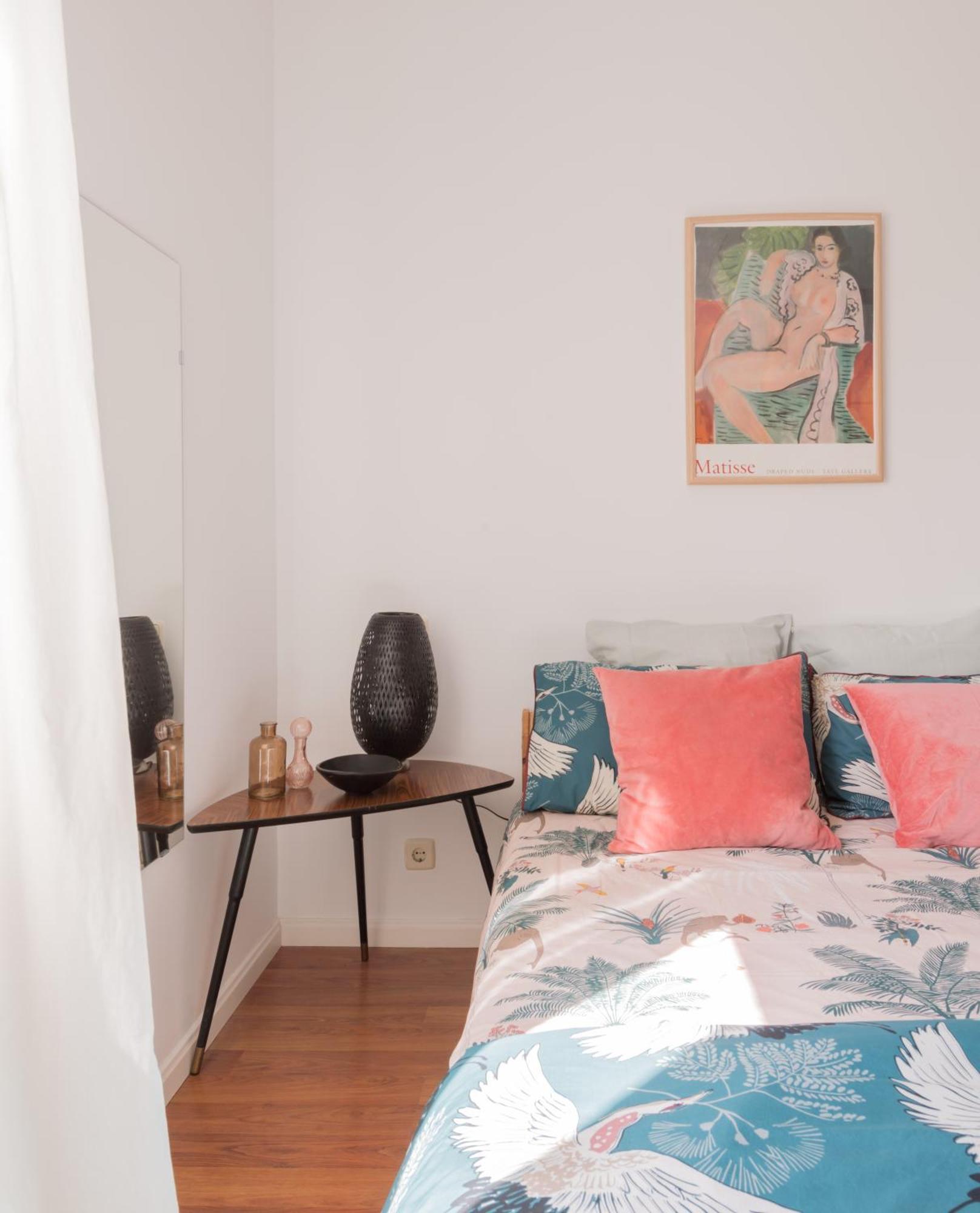 Cozy And Stylish With Natural Light And Vibrant Decor